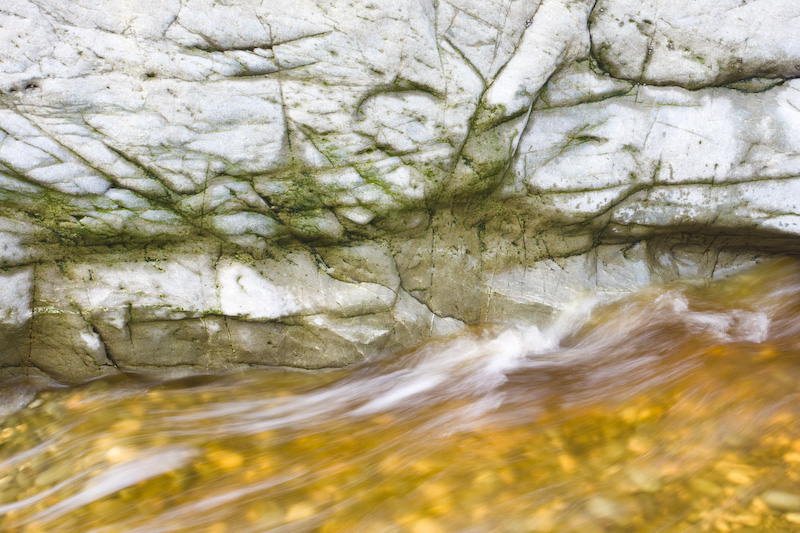 Stream At Base Of Rock